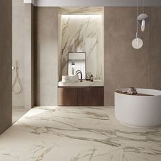 an elegant bathroom with marble floors and walls