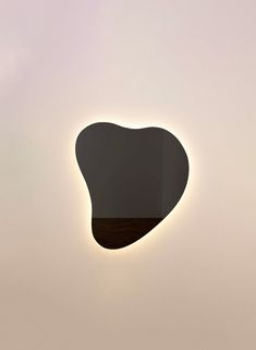 an image of a heart shaped object in the sky