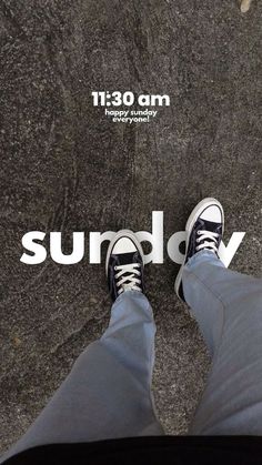 a person standing on the ground with their feet propped up in front of an advertisement for sundry