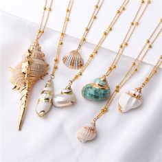 SPECIFICATIONS material: Sea Shell Necklace Type: Pendant Necklaces Metals Type: Copper Alloy Material: SHELL Item Type: Necklaces Luxury Shell Necklace With Natural Stones For Gift, Affordable Ocean-inspired Shell Necklaces, Piercing Conch, Jewlery Necklace, Celtic Knots, Beach Necklaces, Seashell Jewelry, Seashell Necklace, Conch Shell