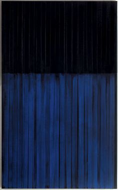 an abstract painting with blue and black stripes on the wall in front of a window