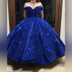 Sparkly Royal Blue Quinceanera Dress Off Shoulder Sequin Ruffle Size 12 (L) Bust 38 1/2 Waist 31 Hips 41 1/4 Hollow To Flow 59 1/4 Fitted Blue Ball Gown Dress, Blue Prom Season Evening Dress, Glamorous Blue Ball Gown Dress, Blue Fitted Dress For Quinceanera, Blue Glamorous Dress For Prom Season, Glamorous Blue Dress For Prom Season, Glamorous Blue Dress For Prom, Royal Blue Royal Style Gala Dress, Royal Blue Royal Style Dress For Gala