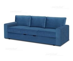 a blue couch sitting on top of a white floor