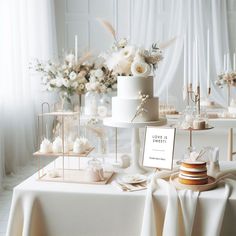 a table topped with lots of cakes and desserts