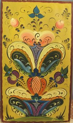 an ornate painting on yellow paper with blue and red accents, in the shape of a flower