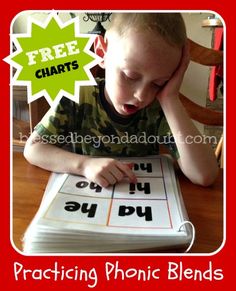 a young boy sitting at a table with his hands on top of a book and the words practicing phonic blends