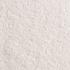 the texture of white carpet is very soft