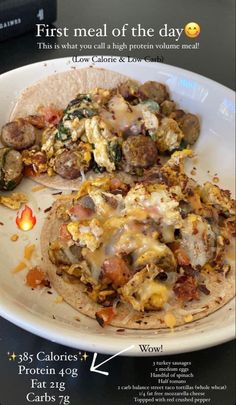 a plate with some food on it and an advertisement for the first meal of the day