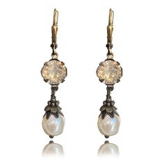 PRICES MAY VARY. Add a touch of beauty and luxury to your life - Jewelry is the purest expression of beauty, style, and good taste - and you deserve nothing but the finest. With an elegant classic design and a dazzling sparkly baroque style pearl crystal at its center, these crystal drop dangle pierced earrings are exactly what you need to add that extra sparkle of luxury to your outfits! The Golden Shadow topaz earrings are made with Austrian crystals. Lose yourself in these vintage earrings wi Pretty Pearl Earrings, Gold Pearl Earrings Dangle, Vintage Prom Jewelry, 90s Prom Jewelry, Funky Jewelry Earrings, Pearl Earring Wedding, 1920s Accessories Jewelry, Cool Earrings, 50s Jewelry