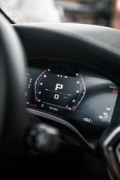 the dashboard of a car is shown with buttons and numbers on it's display