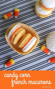 candy corn and french macarons on a striped tablecloth with text overlay