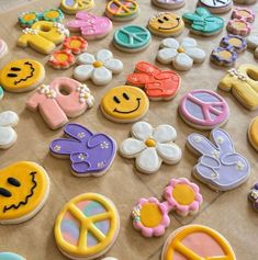 some decorated cookies are laying on a table