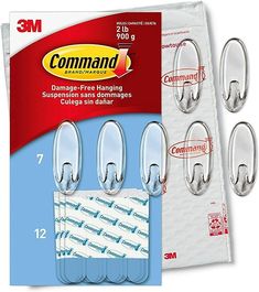 three packs of command bandages are on display