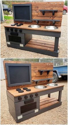 an outdoor kitchen made out of pallets and wood with two televisions on top