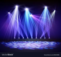 three spotlights shine brightly on a stage with blue and purple lights in the background