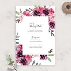 an elegant floral wedding reception card