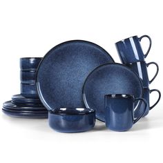 a blue dinner set with cups and saucers