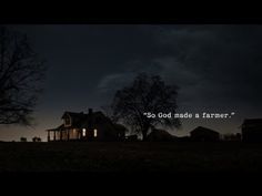 a house with the words so god made a farmer in front of it at night