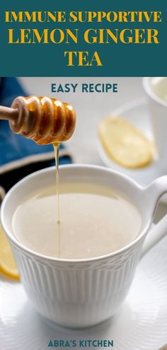 the recipe for lemon ginger tea is being drizzled with honey from a spoon