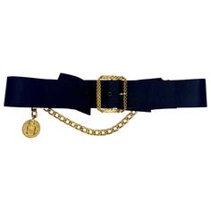 Chanel Vintage Black Satin Bow with Gold Buckle, Chain and Medalion Belt. This vintage Chanel belt is a luxury addition to any closet. The item features a black satin bow and a large gold hardware buckle with a gold hardware chain and medallion. Can be worn multiple ways. Item is in very good condition. Belt Chanel, Chanel Chain Belt, Collage Pics, Belt Chain, Satin Noir, Gold Chanel, Chanel Vintage, Chanel Belt, Chain Belt