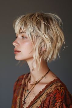 Explore trendy short hairstyles with bangs for 2024! Discover new styles and inspiration for your next haircut. ✨ #ShortHairstyles #Bangs #HairInspiration Short Shaggy Hairstyle Women, Bangs For 2024, Short Alternative Haircuts With Bangs, Bang Trend 2024, Alternative Haircuts Medium With Bangs, Hair Bang Trends 2024, Hair Ideas Short, Funky Haircuts, Bob Pixie Cut