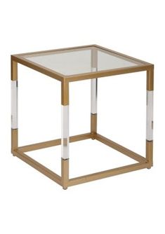 a gold and clear side table with glass top on an isolated white background for display