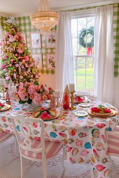 A magical dining room that captures the joy of the season. This custom tablecloth paired with pink and gold decor blends charm and sophistication for a colorful Christmas. Spoonflower has the unique, high-quality fabric and wallpaper ideal for adding a personal touch to your home. Let your creativity shine and make your holidays unforgettable! 🌟 Via @mrs.isabellemoore, wallpaper danika_herrick - 8768482, tablecloth karijoy - 9221276 #HolidayTablescape #FestiveDecor #ChristmasInspo