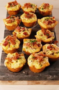 small muffins with bacon and cheese on a tray