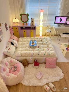 a child's bedroom is decorated in pink and white