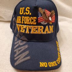 U.S. Air Force Veterans "No One Comes Close" Cap. Brand New, Never Worn. Adjustable Blue Velcro Strapback For A Perfect Fit. Cap Has American Flag With An Eagle. Premium Quality Embroidery. "Veteran" Black Embroidery On The Right Side Of The Cap. "No One Comes Close" Yellow Embroidery On The Back Of The Cap By The Back Strap. 100% Acrylic - Comes From A Smoke Free Home. Awesome Looking Cap! Every Veteran Should Have This Cap! Don't Miss Out!! Yellow Embroidery, Air Force Veteran, Black Embroidery, U S Air Force, An Eagle, Us Air Force, Back Strap, Right Side, Blue Man