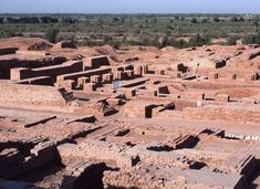 an aerial view of the ruins of a village