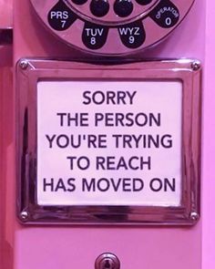 an old fashioned pink phone with a sign on the front saying sorry the person you're trying to reach has moved on