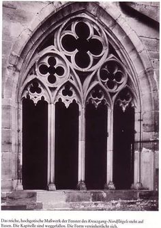 an old photo of a gothic church window