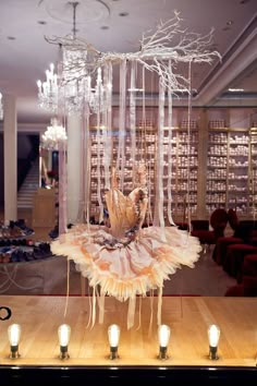 a chandelier hanging from the ceiling in a store