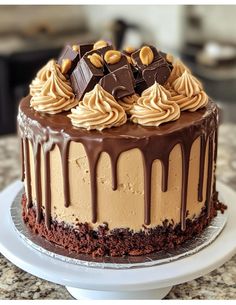 a cake with chocolate icing and nuts on top