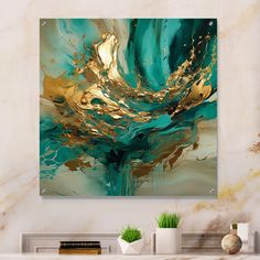 an abstract painting with gold and teal colors on a white wall above a fireplace mantel