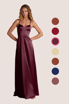 a woman in a long dress standing with her hands on her hips and the color swatches behind her