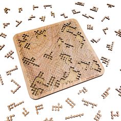 a wooden puzzle with the words diabolal - 200p on it and scattered letters