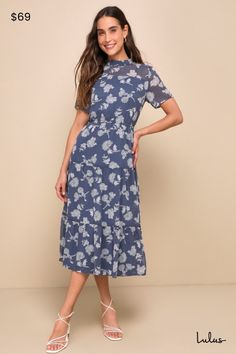 Get a lovely look for an evening out with the Lulus Floral Dressed Up Dusty Blue Floral Print Midi Dress! Elegant cream and black floral print embellishes dusty blue lightweight woven chiffon as it forms a mock neck (with back button closure), sheer decolletage and short sleeves, and a darted bodice. Elastic waist tops a tiered skirt that flows to a modest midi length. Pair with strappy heels and a clutch for the perfect date night 'fit! Fit: This garment fits true to size. Length: Mid-calf leng Women's Professional Clothing, Midi Dress Elegant, Blue Floral Print Dress, The Perfect Date, Professional Clothing, Tiered Skirts, Dresses Xxl, Dress Dusty, Floral Print Midi Dress