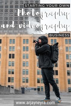 a man standing in front of a tall building with the words starting your own photography and videography business