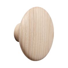 a wooden door knob with an oval shape