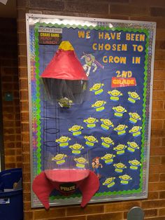 a bulletin board with an image of a red cone on top and a green cone on the bottom