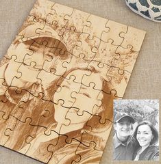 two people are shown on a wooden puzzle