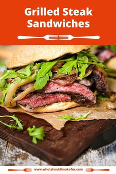 grilled steak sandwiches on a cutting board with text overlay that reads grilled steak sandwiches