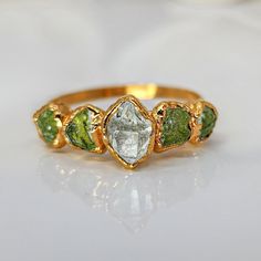 raw peridot ring Earthy Crystals, Swamp Wedding, Nontraditional Rings, Engagement Ring Boho, Solder Jewelry, Birthstone Jewelry Mothers, Raw Diamond Ring, Boho Engagement Ring, Raw Peridot