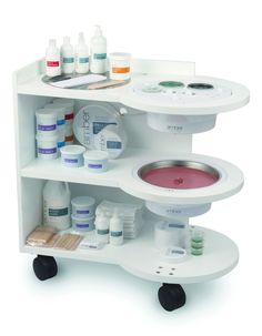 a white shelf with many different types of medical supplies on it's wheels and shelves