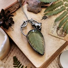 ♠ Real fern necklace with a wild hare and a crescent moon by Ragana The Wicth ♠ - This cottagecore pendant is made of Tin, copper and glass. - Dimensions: 7 cm long and 3.5 cm wide (2.8 inch long and 1.4 inch wide). - The pendant is covered with dark patina, which gives it some old-silver look. - Pendant goes with a chain. It's 50 cm long, but I can customize it to your needs. Just leave a note in the 'message to seller' box at a checkout. - Each piece of my jewelry is made in my home studio.. - Forest Witch Jewelry, Flower Forest, Copper Electroforming, Forest Jewelry, Fern Necklace, Wild Hare, Easy Crafts To Sell, Woodland Jewelry, Terrarium Necklace