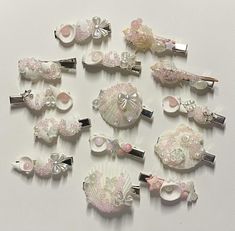 a bunch of hair clips that are on a table