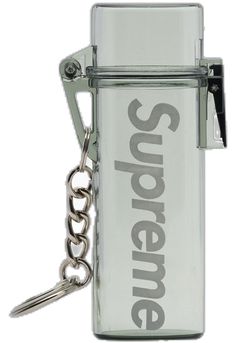 a lighter keychain with the word supreme printed on it's front and back