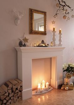 a living room with a fire place and christmas decorations